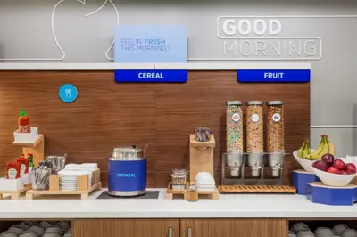 a kitchen with a counter with food on it at Holiday Inn Express & Suites Ridgecrest - China Lake by IHG in Ridgecrest
