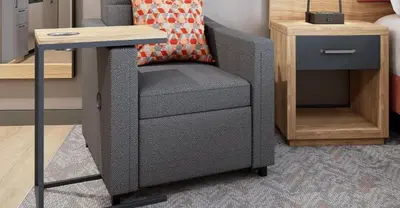 a desk and a chair in a room at Candlewood Suites - Loma Linda - San Bernardino S by IHG in Loma Linda