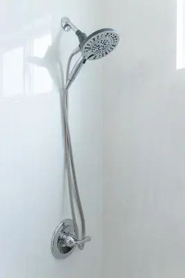 a shower with a shower head in a bathroom at Bright & Cozy Getaway-10min to Downtown LA in Alhambra