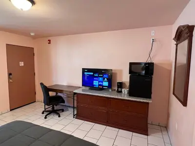 a room with a desk with a computer on it at Frazier View Motel in Frazier Park