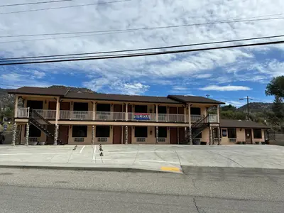 a building on the corner of a street at Frazier View Motel in Frazier Park
