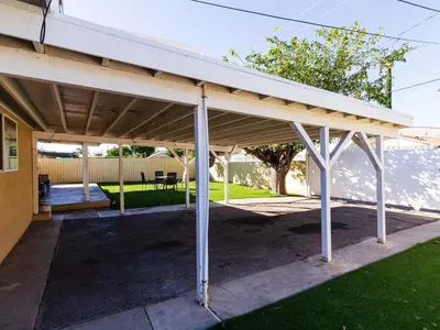 awning over a patio of a house at 5 Bedroom Charmer in Granada Hills in Granada Hills