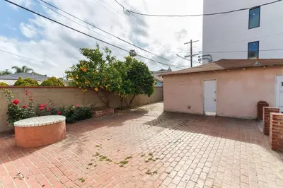 a brick courtyard with a building next to a building at New 4 bedroom Modern Villa in Mar Vista in Los Angeles