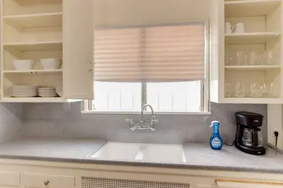 a kitchen counter with a sink and a window at New 4 bedroom Modern Villa in Mar Vista in Los Angeles