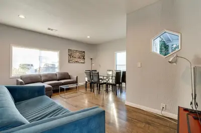 a living room with a couch and a table at Cozy 3 bedroom San Fernando Valley in San Fernando