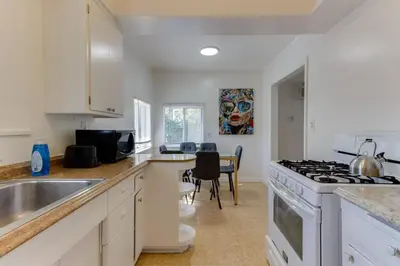a kitchen with a sink and a stove top oven at 2 Bedroom Mid-Wilshire Charmer close to Downtown in Los Angeles
