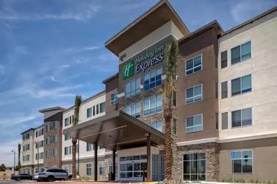 an image of a hotel building with a sign on it at Holiday Inn Express & Suites Ontario - Chino Hills by IHG in Chino Hills