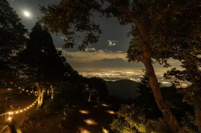 a view of a city at night with lights at 100 Mile View-Fire Pit, Romantic, Peaceful, Private in Crestline