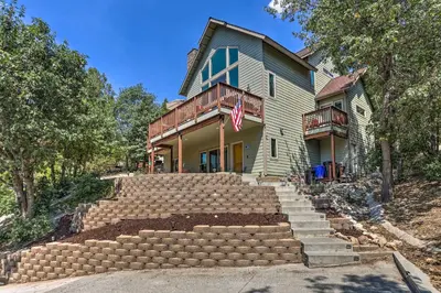 a house with steps in front of it at The Zen Playhouse with Lake Arrowhead Access! in Lake Arrowhead