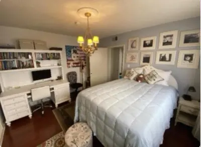 a bedroom with a bed and a desk with a computer at Stay in Beverly Hills - Private Bedroom & Bath for female only - near Beverly Center, Cedars Sinai Hospital, The Grove in Los Angeles