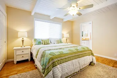 a bedroom with a bed and a ceiling fan at Beautiful Views - Sand Section of Manhattan Beach 2 Bed/2 Bath in Manhattan Beach