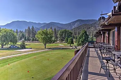 a balcony with a view of a golf course at Pine Mountain Club Home with Beautiful View! in Frazier Park