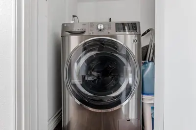 a washer and dryer in a room at Luxury 2-Bedroom Condo in Studio City in Los Angeles