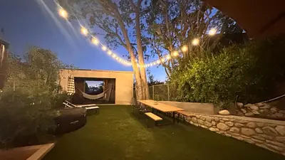 a garden with a bench and a tree with lights at Echo Park Hills - Walk to Dodger Stadium - Near DTLA SoFi in Los Angeles