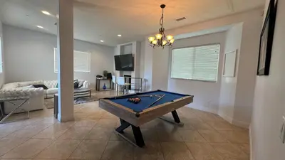a living room with a pool table in it at LA Dream Gem - Beautiful Home with Spa in Los Angeles