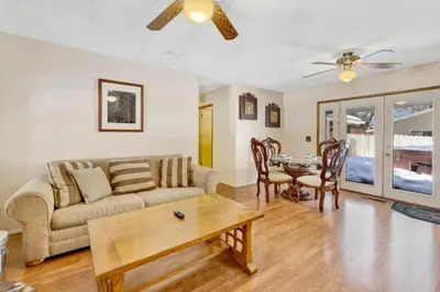 a living room with a couch and a table at Crestwood Summit #2119 by Big Bear Vacations in Big Bear Lake