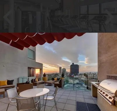 a view from the roof of a building with tables and chairs at Luxury Residence Loft 3 Beds with Pool and Gym in Los Angeles