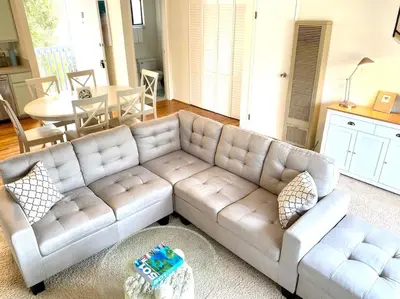 a living room with a couch and a table at Modern & Cozy Gem ~ Walk to the Beach ~ Queen Beds in Carpinteria