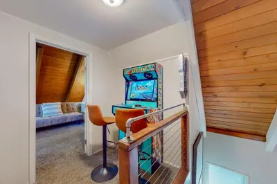 a small room with a desk and a game console at The Retreat on Wabash Lane in Lake Arrowhead