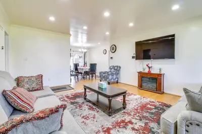 a living room with a couch and a coffee table at Luxury Oasis Home w/Pool Near CSUN-6 Guests in North Hills