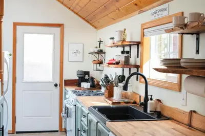 a kitchen with a sink and a window at Aery Pines in Wrightwood