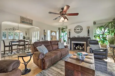 a living room with a couch and a fireplace at Walk to Ventura Beach Comfy Home with Ocean Views in Ventura