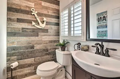 a bathroom with a toilet and a sink at Walk to Ventura Beach Comfy Home with Ocean Views in Ventura