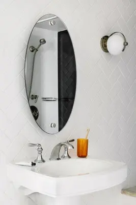 a bathroom with a sink and a mirror at The Eden in Los Angeles