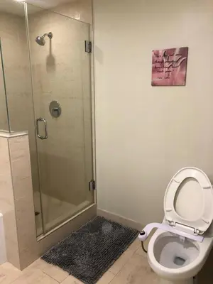 a bathroom with a shower stall and a toilet at Glendale Americana 2 Bedroom 2 Bathroom Condo in Glendale
