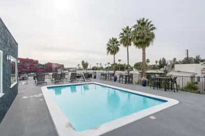 a swimming pool on the roof of a building at Skyline Terrace Executive Jr One Bedroom with Balcony and Pool in Los Angeles