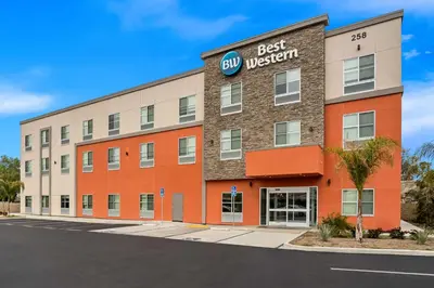 an office building with a best western sign on it at Best Western San Bernardino Hotel in San Bernardino