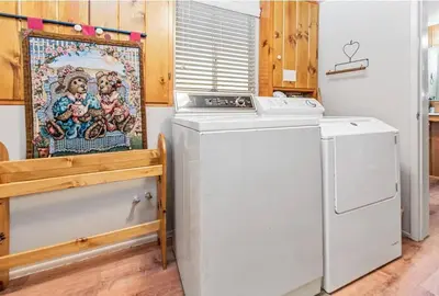 a white washer and dryer in a room at Paradise Cabin in Big Bear City