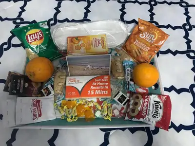 a tray of food with oranges and other snacks at Romantic Coastal Private Room in Oxnard