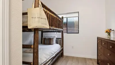 a couple of bunk beds in a room at Honeypot by AvantStay Indoor Pool Hot Tub in Big Bear Lake