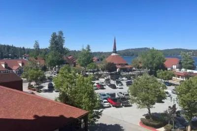 an aerial view of a parking lot in a town at Vintage Village Walk Cottage in Lake Arrowhead