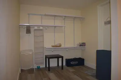 a room with a ladder and a table and a shelf at Charming private guest Suite near Disney/Beach in Westminster