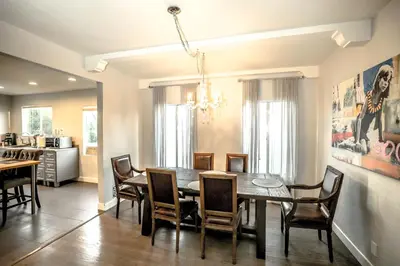 a dining room with a table and chairs at Gorgeous Renovated 3BD 2BA near West Hollywood and Beverly Hills in Los Angeles