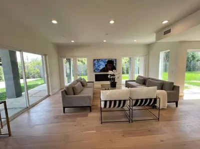 a living room with a couch and chairs and a table at Gorgeous Private and Gated Home in Silver Lake with Pool & Views in Los Angeles