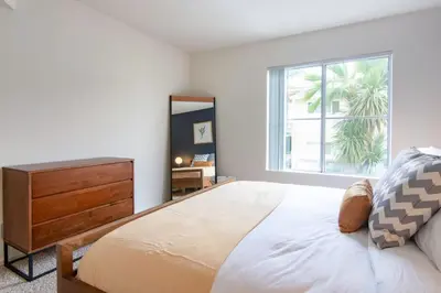 a bedroom with a large bed with a dresser and a window at Hollywood 1BR w Gym Spa Pool nr Metro LAX-52 in Los Angeles