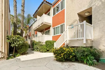 a building with a staircase and flowers in front of it at Marina Del Rey 1BR nr marina shops dining LAX-467 in Los Angeles