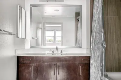 a bathroom with a sink and a mirror at North Hollywood 2BR w Gym Pool nr TJ LAX-880 in Los Angeles