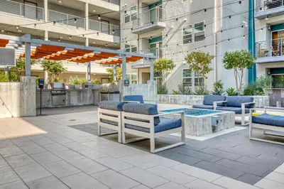 a patio with chairs and a table in front of a building at North Hollywood 2BR w Gym Pool nr TJ LAX-880 in Los Angeles
