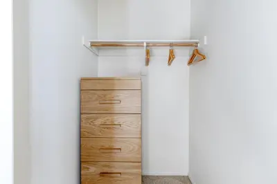 a closet with wooden drawers and a shelf at Century City 2BR w WD BBQ nr Mall LAX-334 in Los Angeles