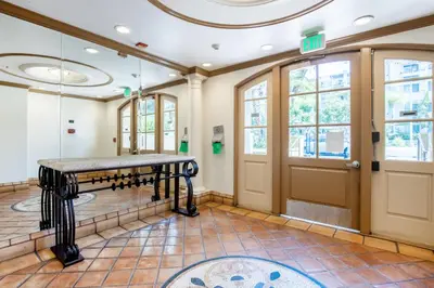 a waiting room with a table in front of a door at Century City 2BR w WD BBQ nr Mall LAX-334 in Los Angeles
