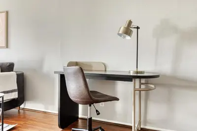a desk with a chair and a lamp on it at N Hollywood 2BR w Gym Pool nr TJ Shops LAX-591 in Los Angeles