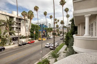 a view of a city street with palm trees and cars at Beverly Hills 2BR near the Grove Rodeo Drive LAX-866 in Los Angeles