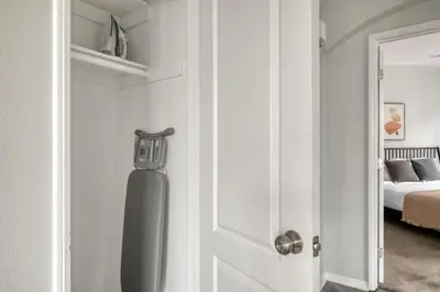 a door leading to a bedroom with a bed at Beverly Hills 2BR near the Grove Rodeo Drive LAX-866 in Los Angeles