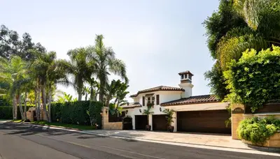 a house on a street with palm trees at Bel Air Luxury Villa 6 bedrooms entire house Los Angeles in Los Angeles