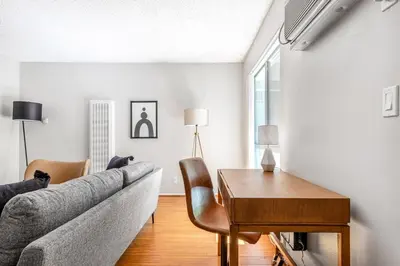 a living room with a couch and a table at Sherman Oaks 1BR w Pool Gym BBQ nr TJ WF LAX-487 in Los Angeles