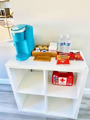 a white shelf with food and a blue blender on it at Beautiful home near Disneyland. Entire place! in Orange